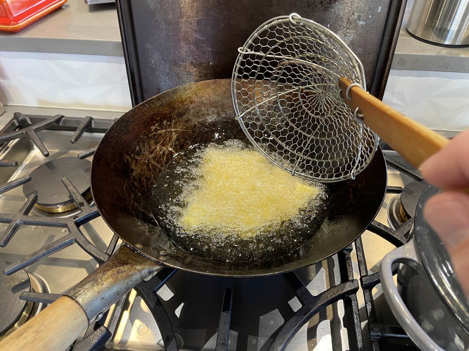 garlic frying in a wok