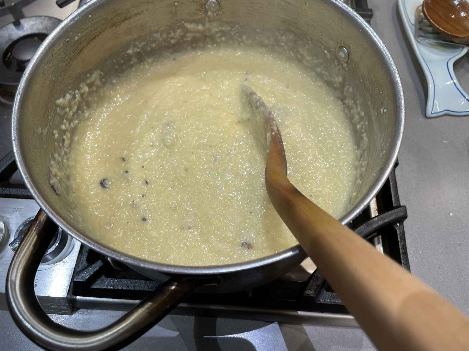 a pot of polenta on the stove top