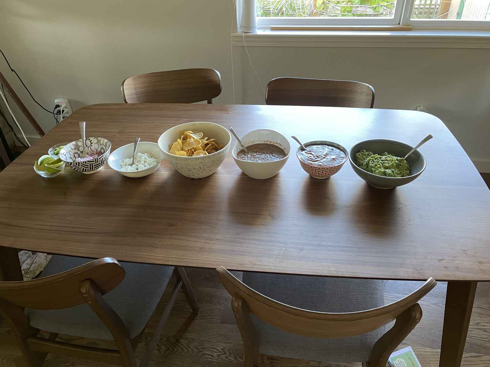 a table full of salsas and shit
